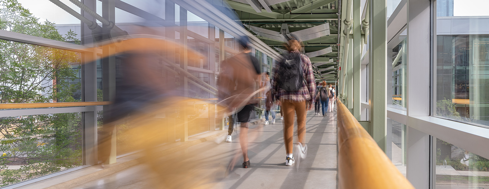 motion blur students walking in pedway