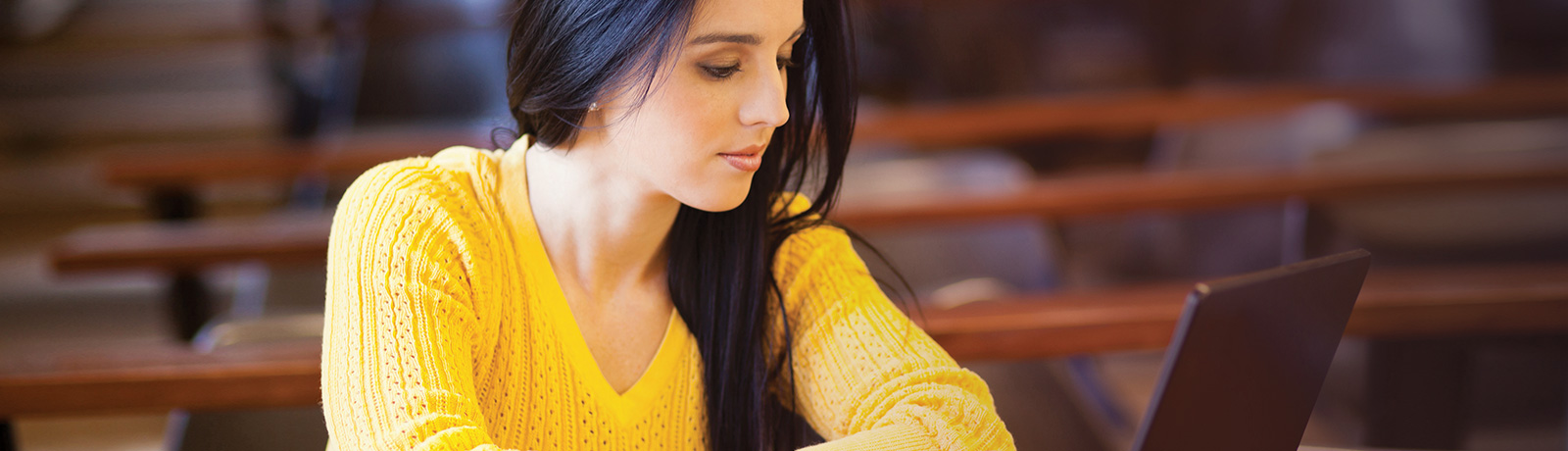 female student on laptop