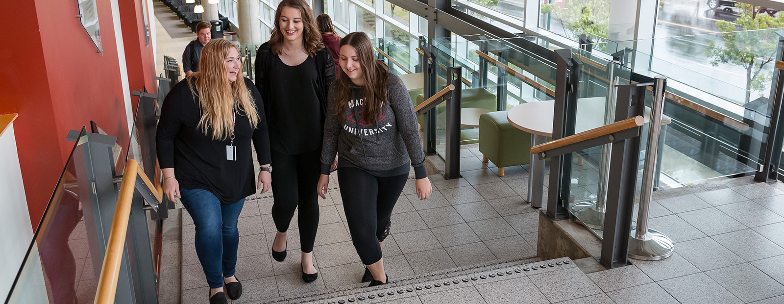 students walking in MacEwan