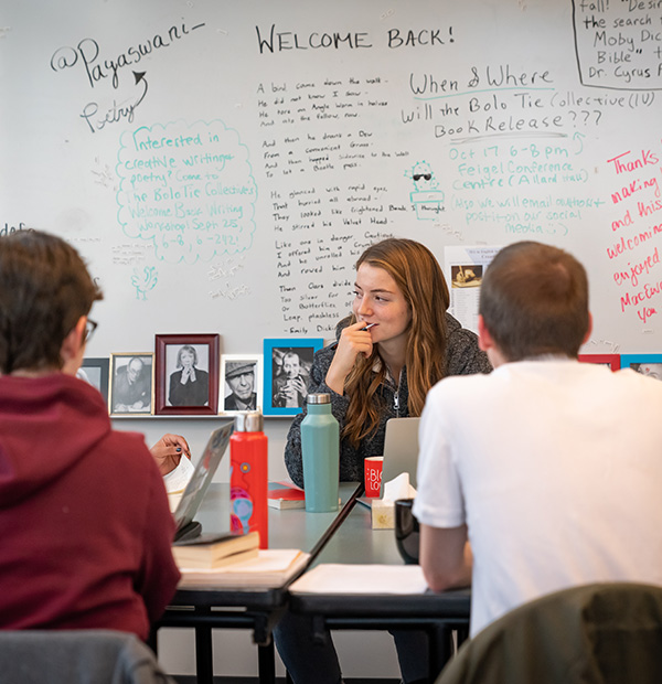 students working in the writing centre