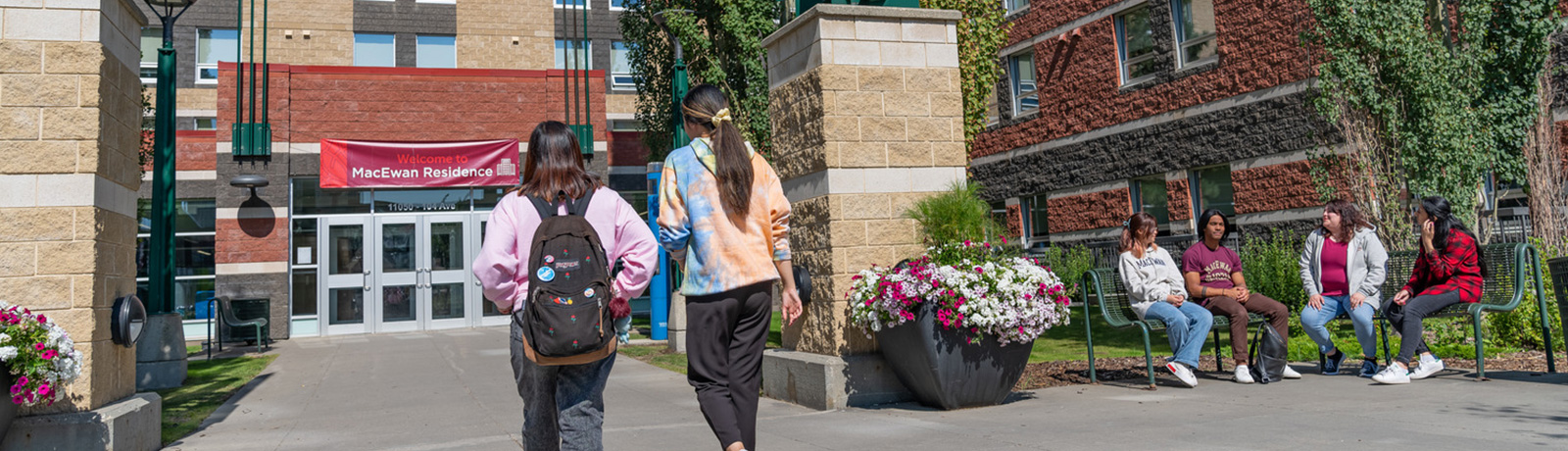 students walking into residence