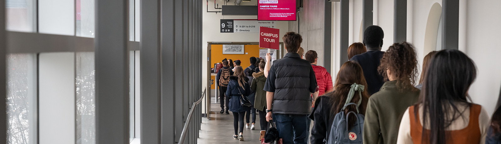 student leading a campus tour