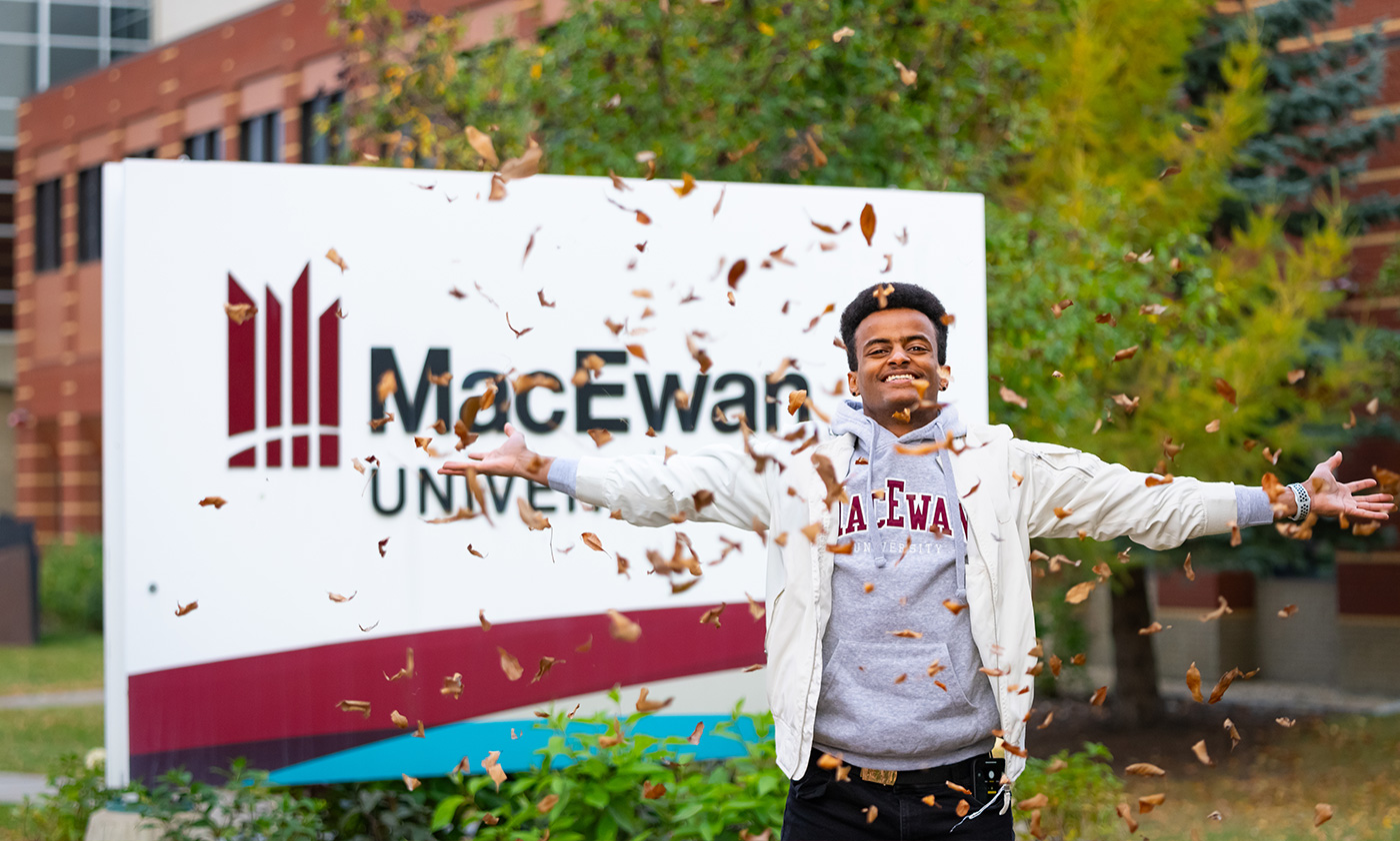 MacEwan clock tower exterior with flowers in front