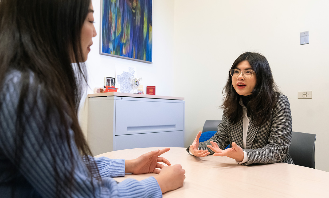 student talking with recruiter